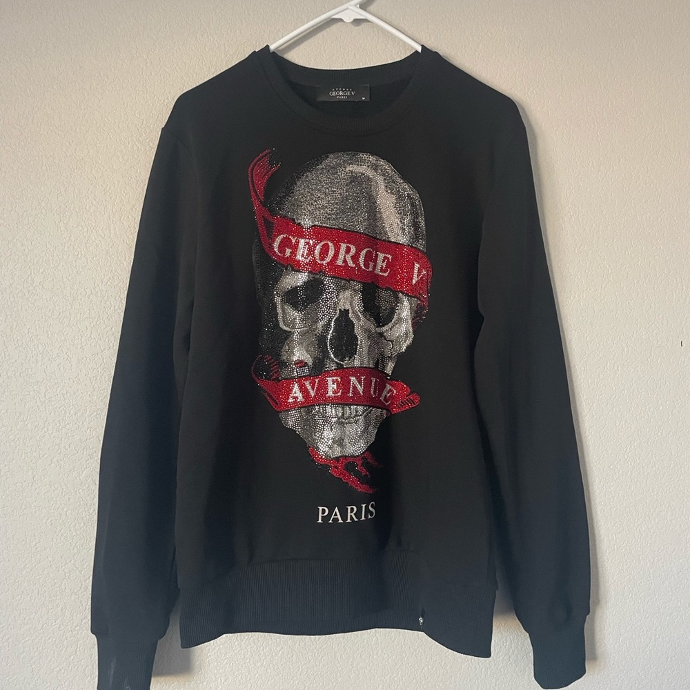 George v Paris with rhinestones , sz medium ,worn 2x. Fits kind of slim